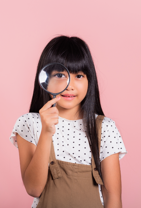 Kid Holding Magnifier